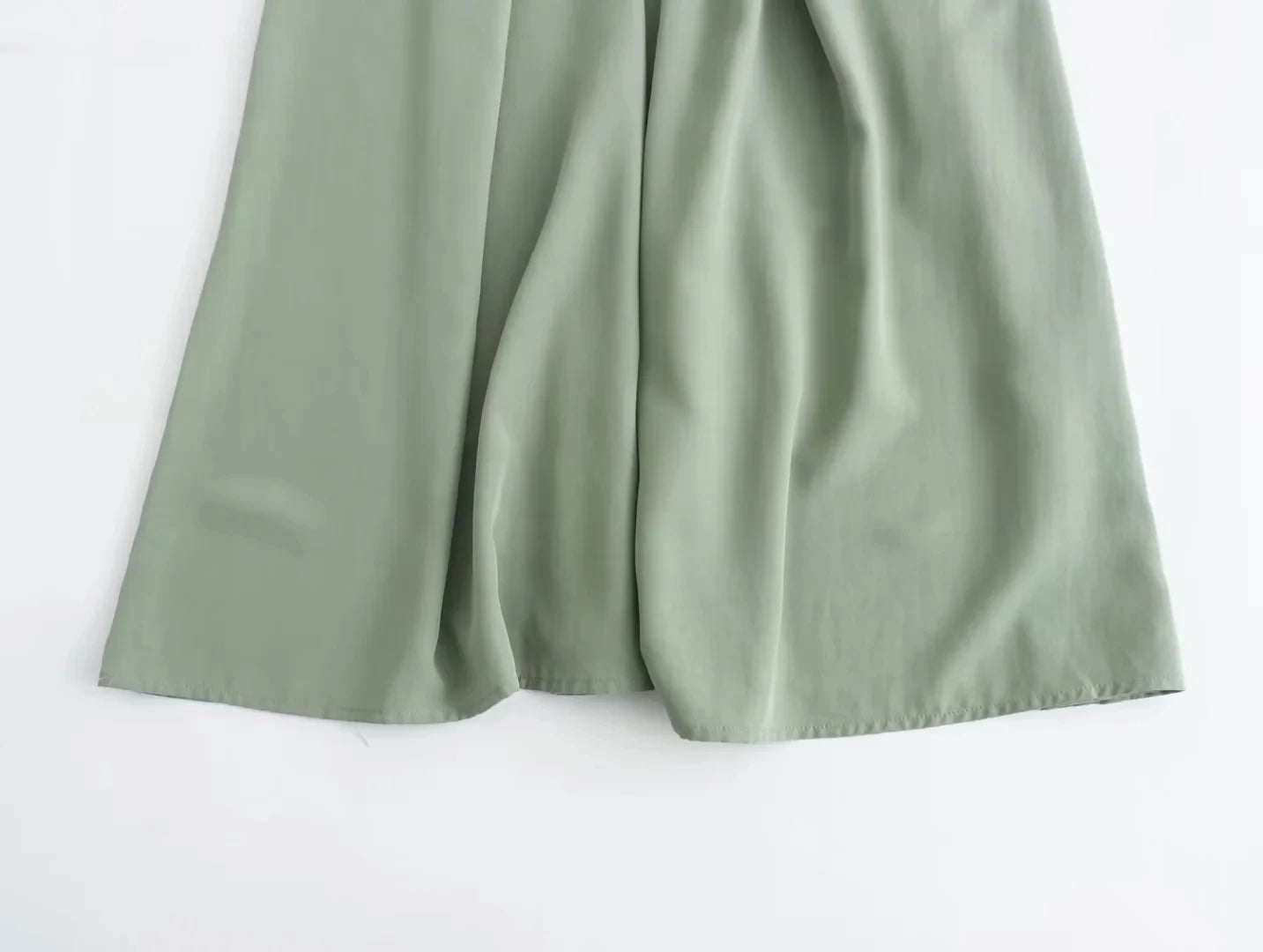 Sleeveless slip dress with thin straps.